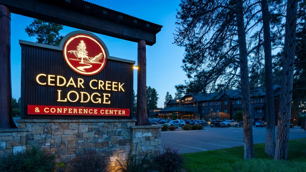 glacier-cedar-creek-sign-dusk-scaled